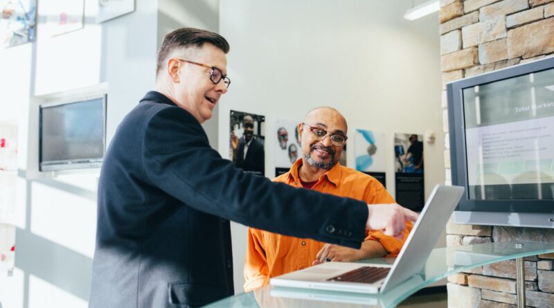 Man Pointing Laptop Computer