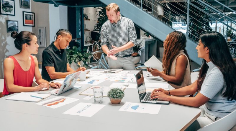 People Having a Meeting in an Office