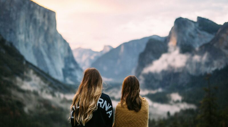 two women facing backwards